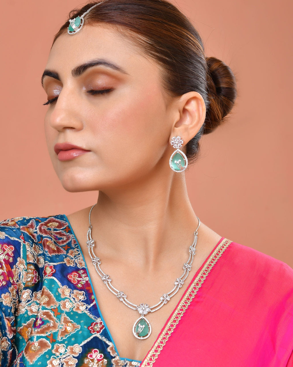 VOJ Silver Plated Teal Green Teardrop Shaped Stone And Ad Stone Jewellery Set With Maang Tikka | Grocsy