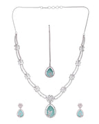 VOJ Silver Plated Teal Green Teardrop Shaped Stone And Ad Stone Jewellery Set With Maang Tikka | Grocsy