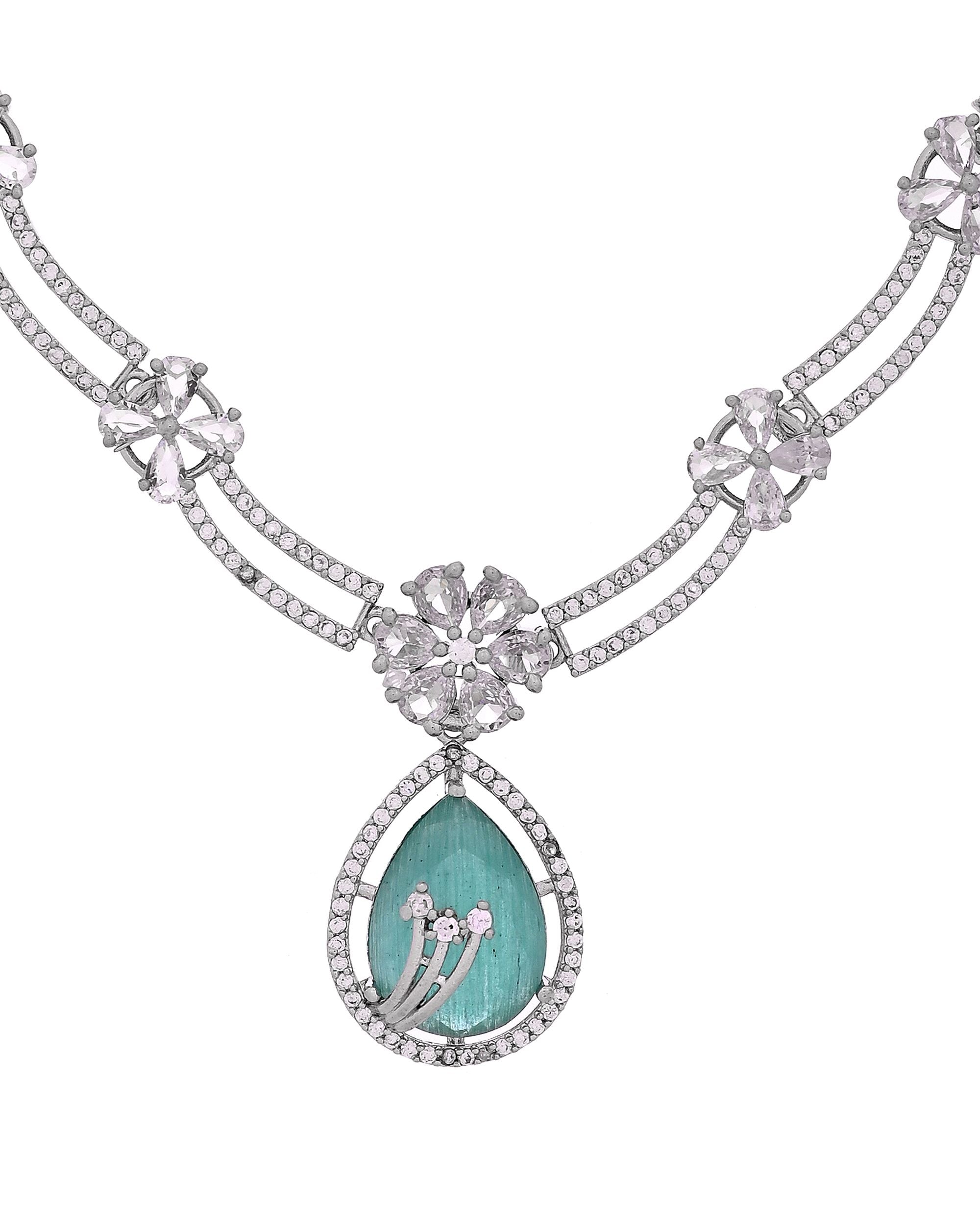 VOJ Silver Plated Teal Green Teardrop Shaped Stone And Ad Stone Jewellery Set With Maang Tikka | Grocsy