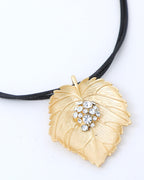 VOJ Leaf Shaped Gold Pandent With Black Necklace | Grocsy