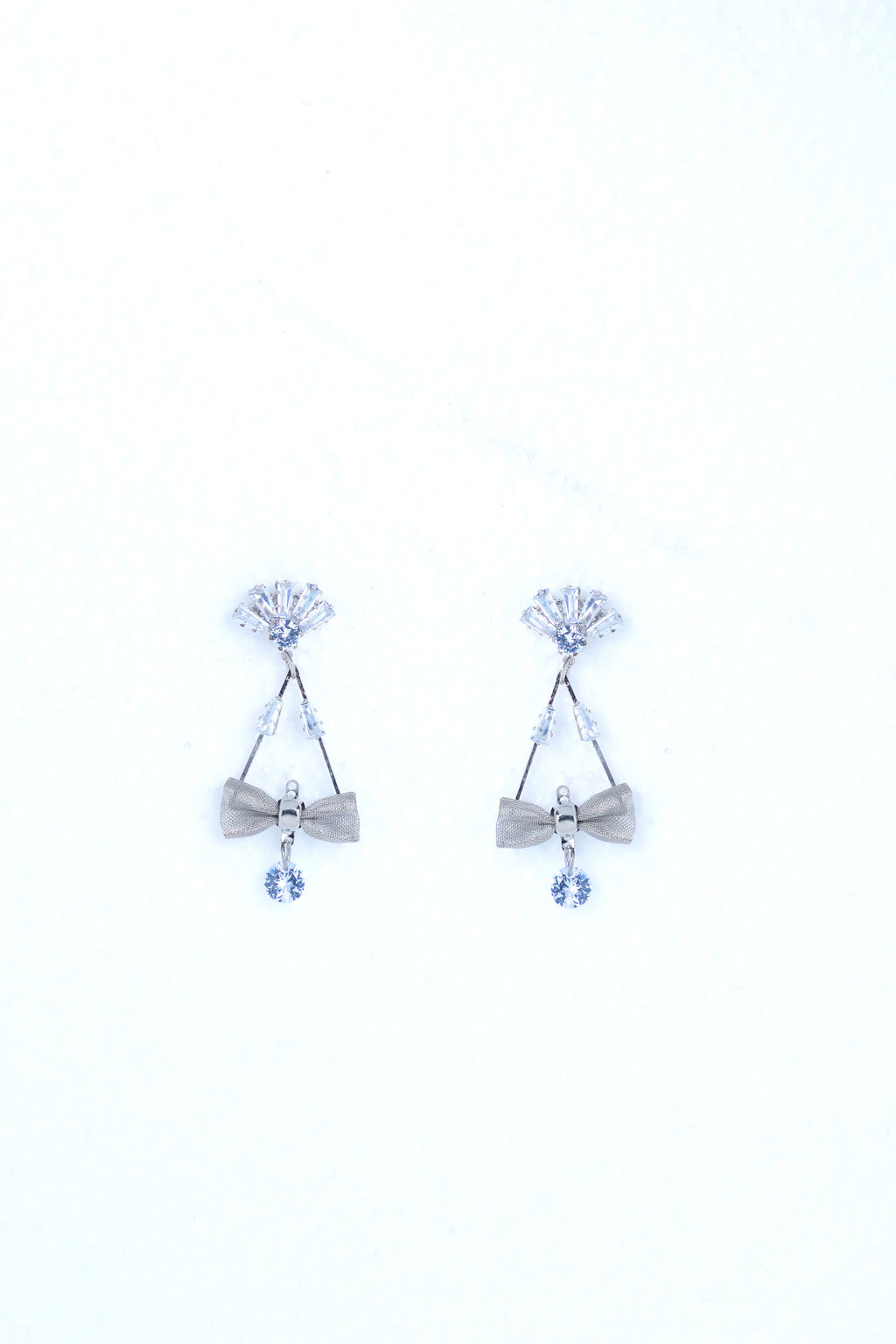 VOJ Silver Plated Stone Studded With Bow Triangle Shaped Earrings
