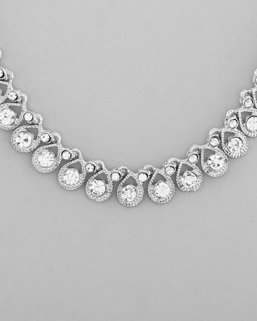 VOJ AD Stone Studded Silver Plated Necklace and Earrings Set | Grocsy
