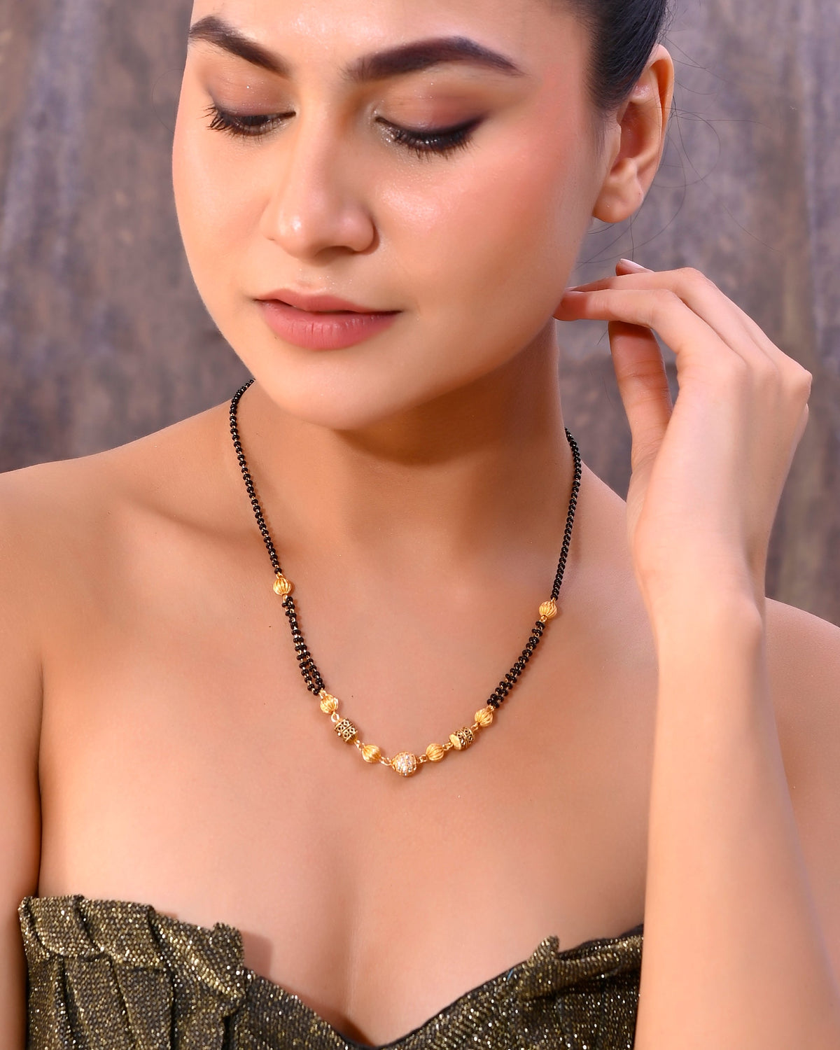 VOJ Gold-Polished Stone Studded Cricular shaped Mangalsutra | Grocsy