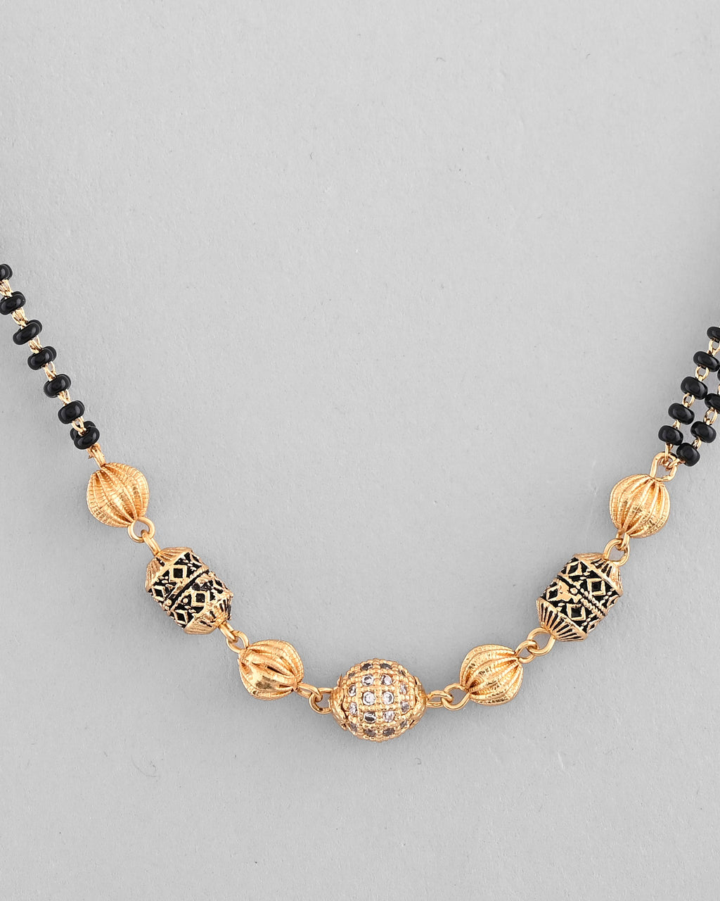 VOJ Gold-Polished Stone Studded Cricular shaped Mangalsutra | Grocsy
