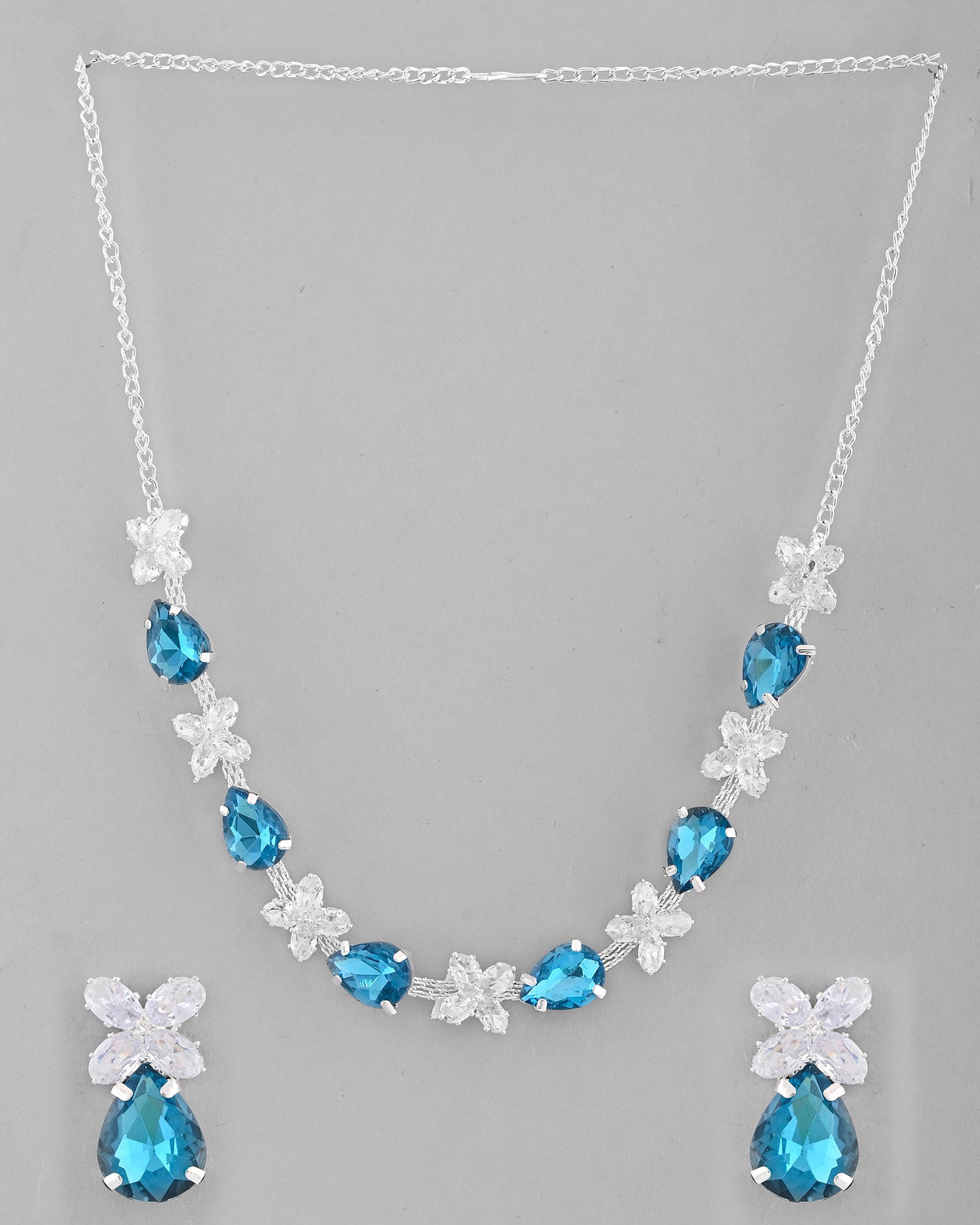 VOJ Silver Plated Blue And White Stone Studded Necklace with Earrings Set