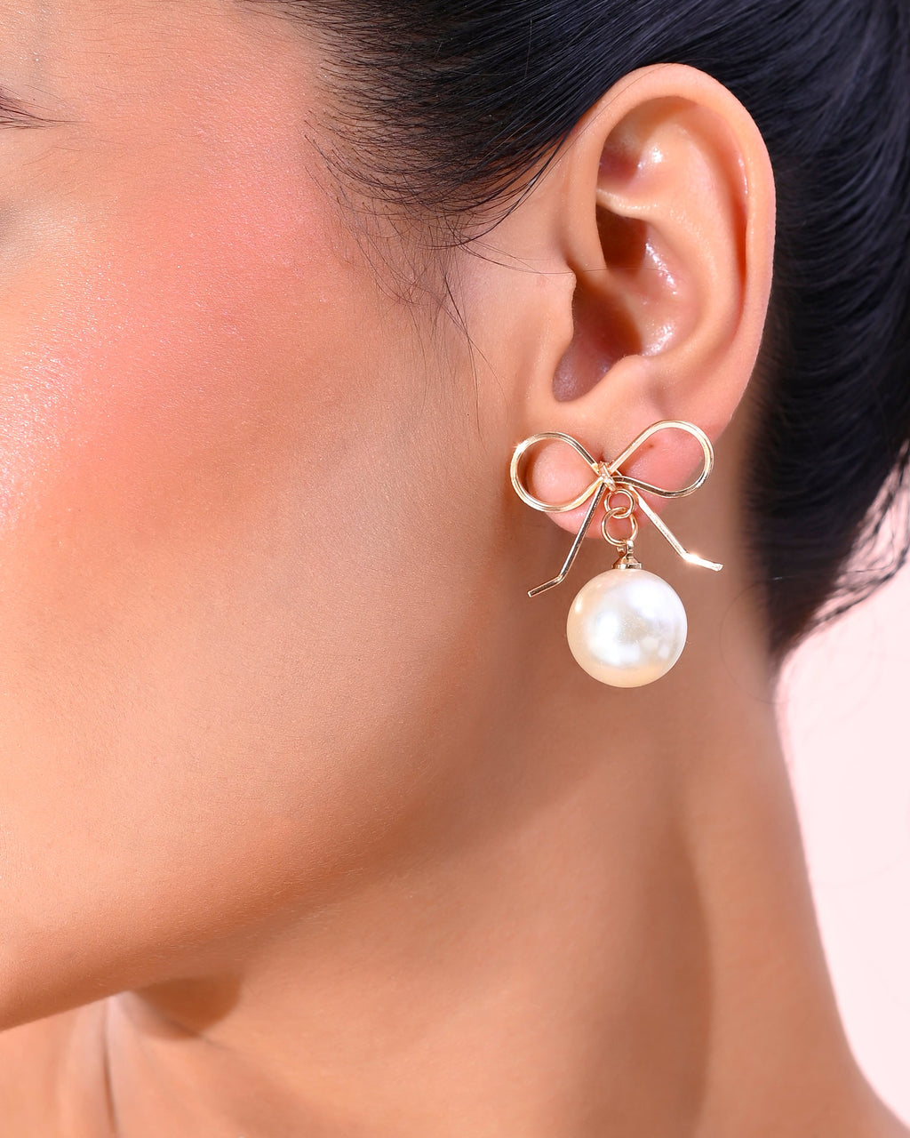 VOJ Gold-Polished Pearl & Bow Shaped Classic Drop Earrings | Grocsy