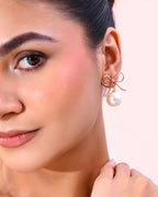 VOJ Gold-Polished Pearl & Bow Shaped Classic Drop Earrings | Grocsy
