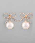 VOJ Gold-Polished Pearl & Bow Shaped Classic Drop Earrings | Grocsy
