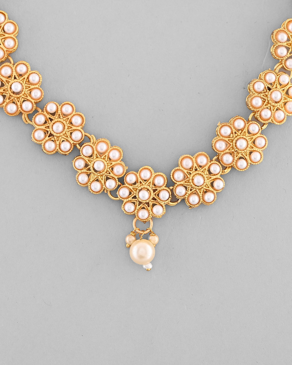 VOJ Gold-Polished Pearl Studded Floral Necklace And Earrings | Grocsy
