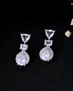 VOJ Silver Plated Ad Stone Studded Drop Earrings | Grocsy
