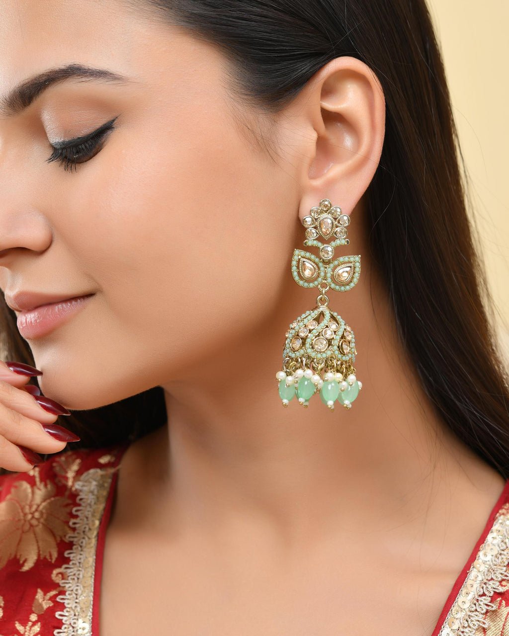 VOJ Mint Green Stone Studded Gold-Polished Jhumkas