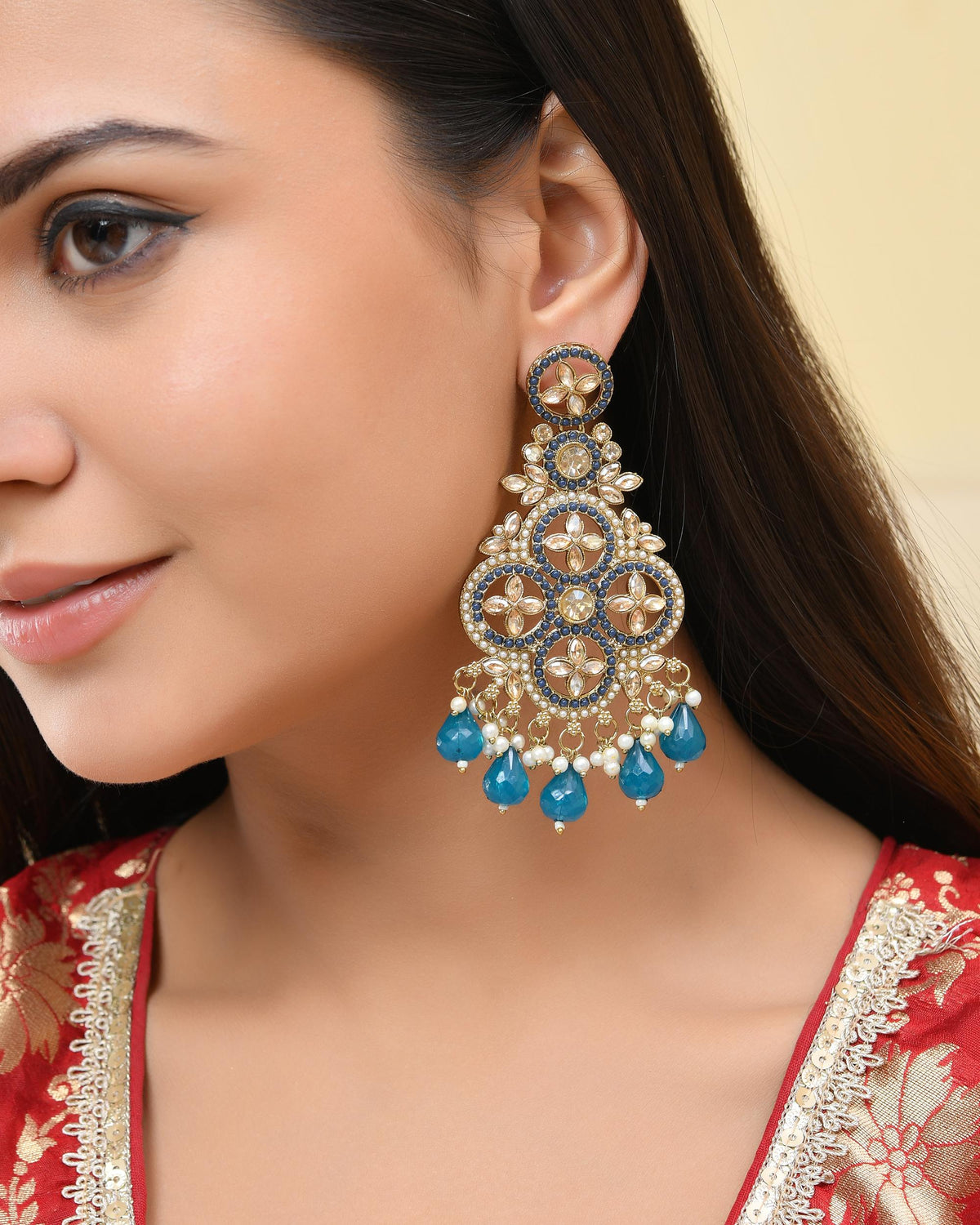 VOJ Blue Stone Studded Gold-Polished Crescent Shaped Earrings