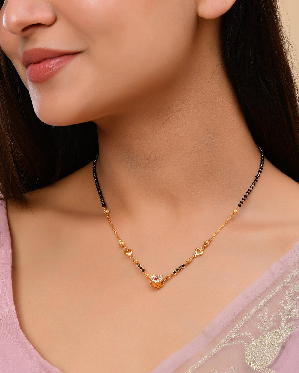 VOJ Gold-Polished Ad Studded Heart Shaped Mangalsutra | Grocsy