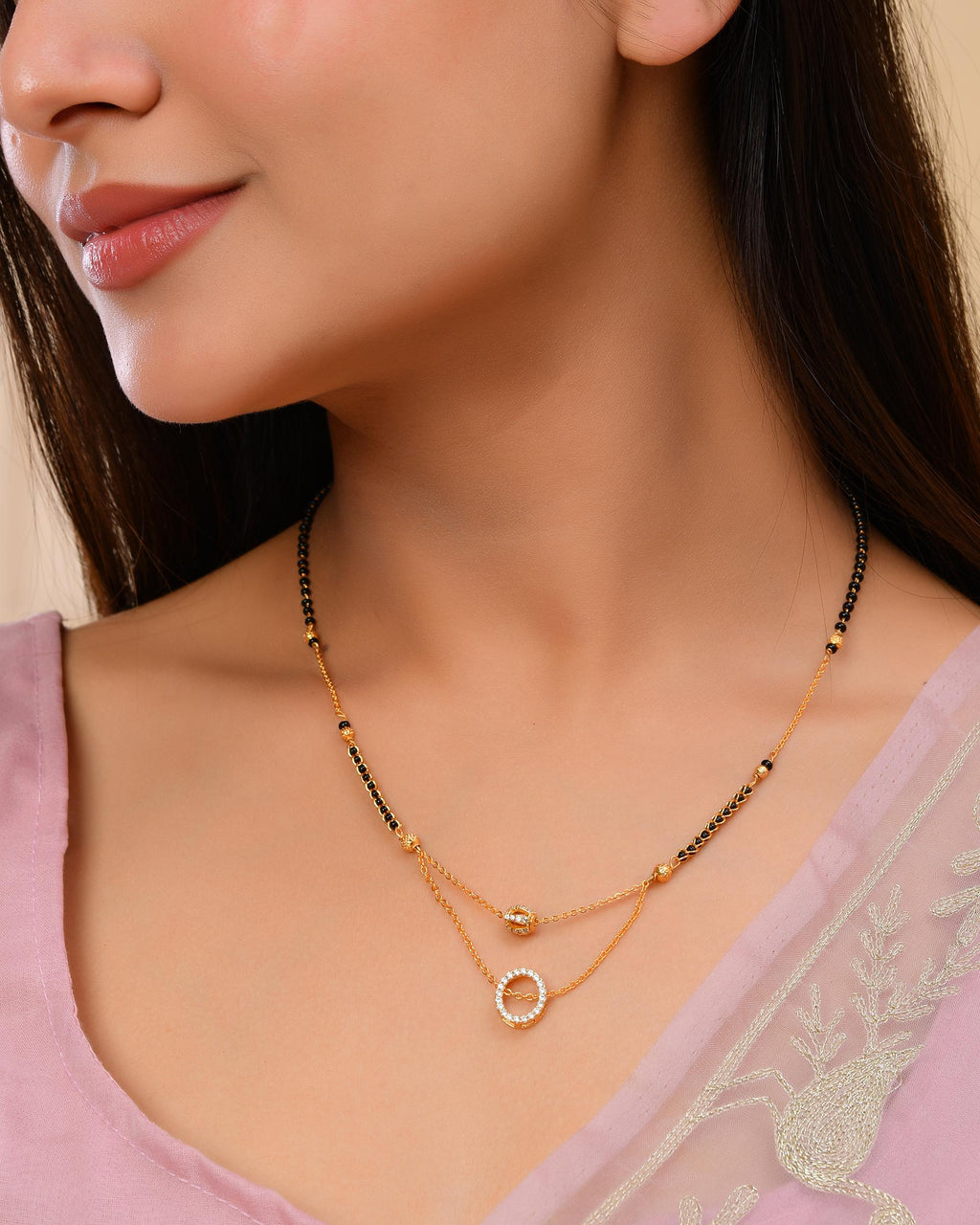 VOJ Gold-Polished Ad Studded Oval Shaped Mangalsutra | Grocsy