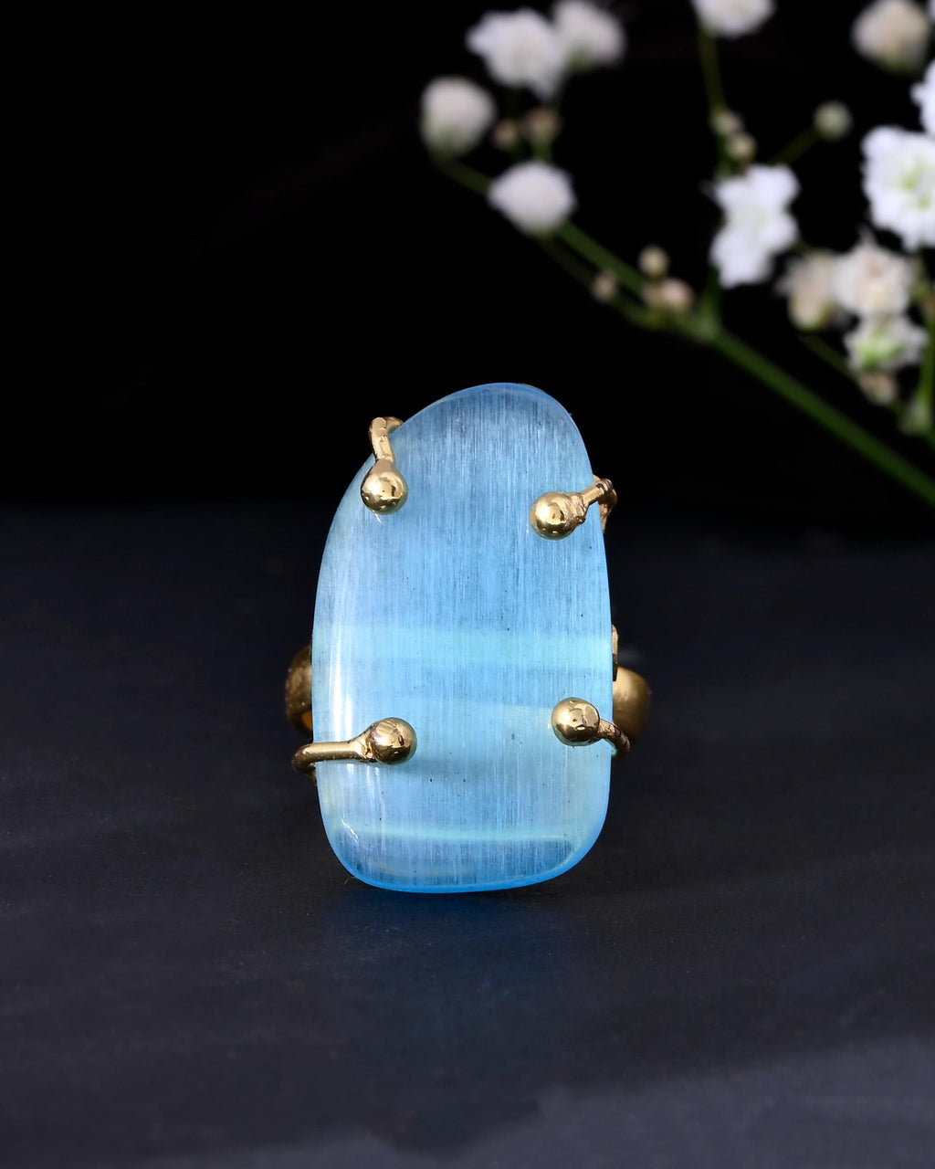 VOJ Gold-Polished Light Blue Stone Studded Ring | Grocsy