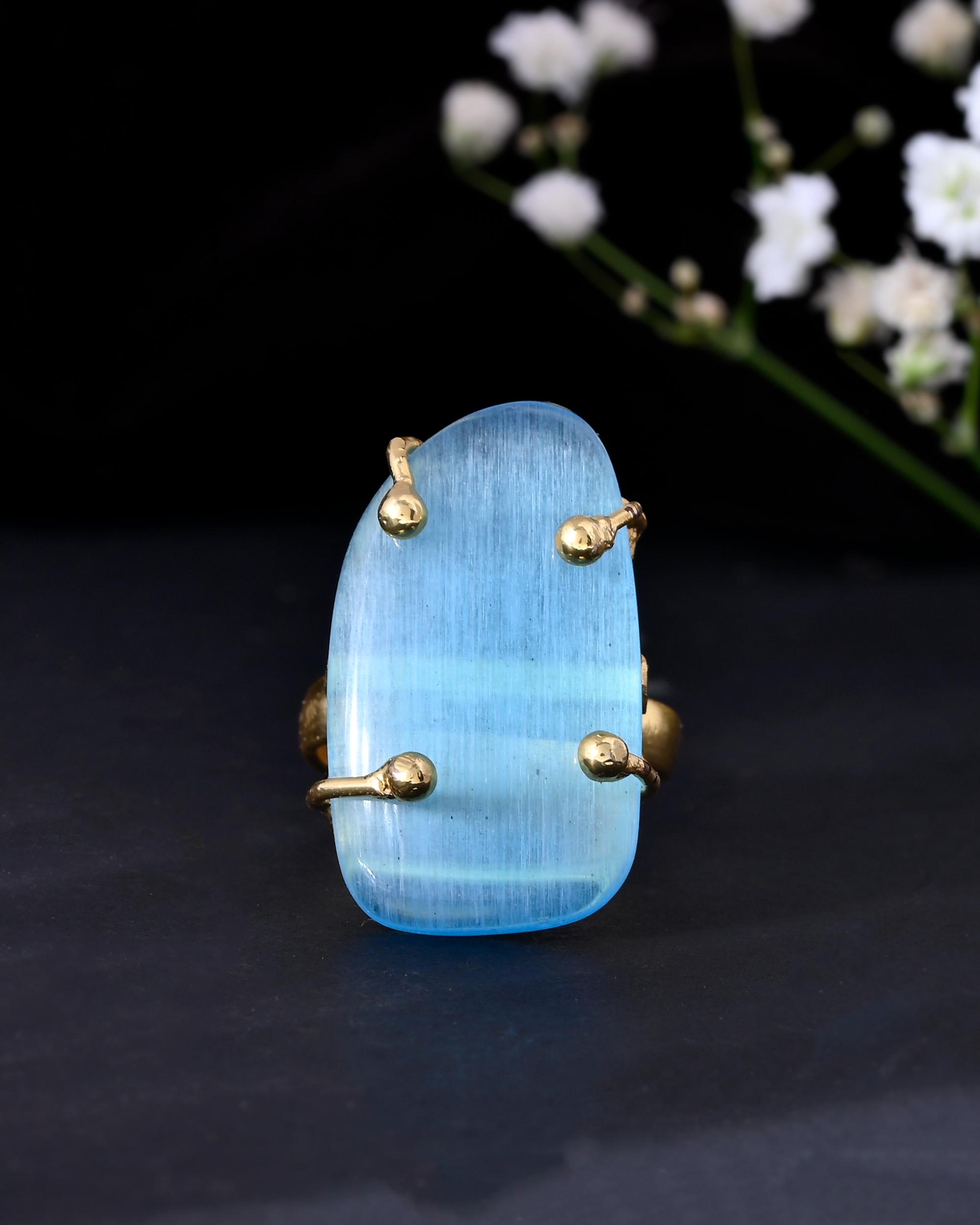 VOJ Gold-Polished Light Blue Stone Studded Ring | Grocsy