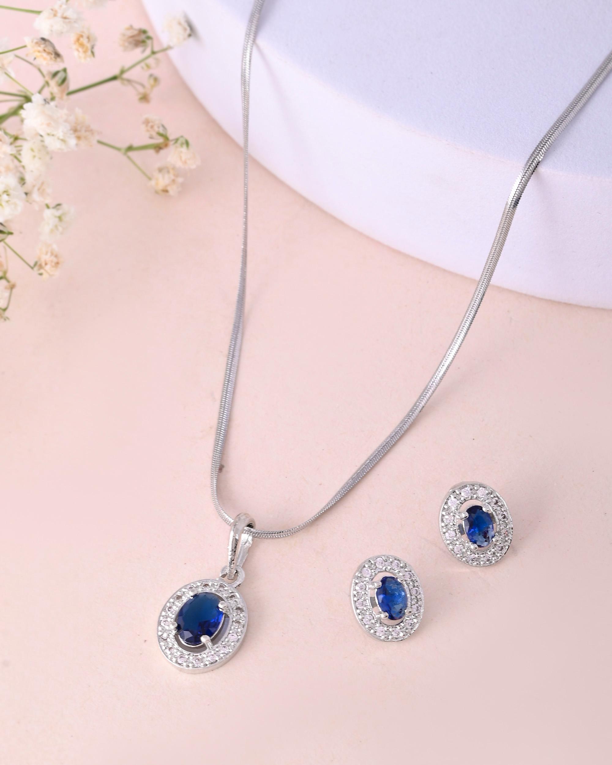 VOJ Silver Plated Blue Ad-Studded Pendant With Chain And Earrings Set