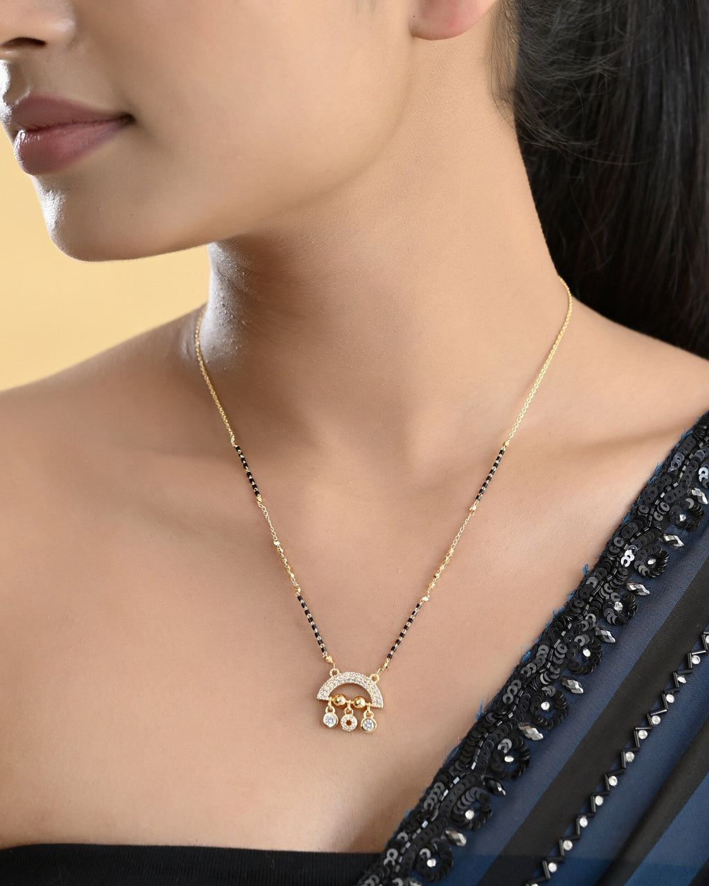 VOJ Gold-Polished AD Studded Half Done Shape Mangalsutra | Grocsy