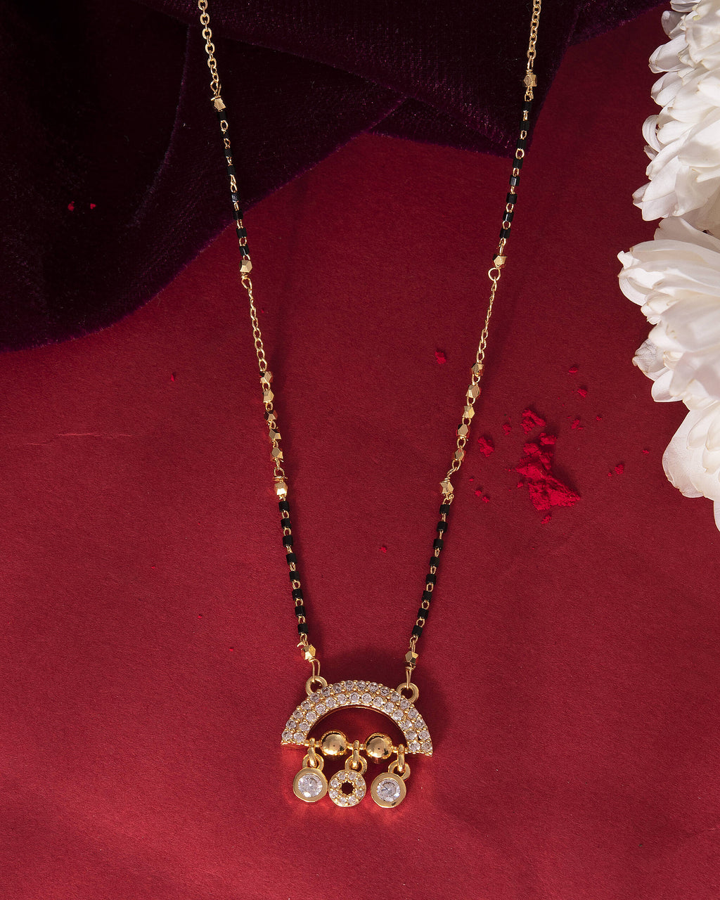 VOJ Gold-Polished AD Studded Half Done Shape Mangalsutra | Grocsy