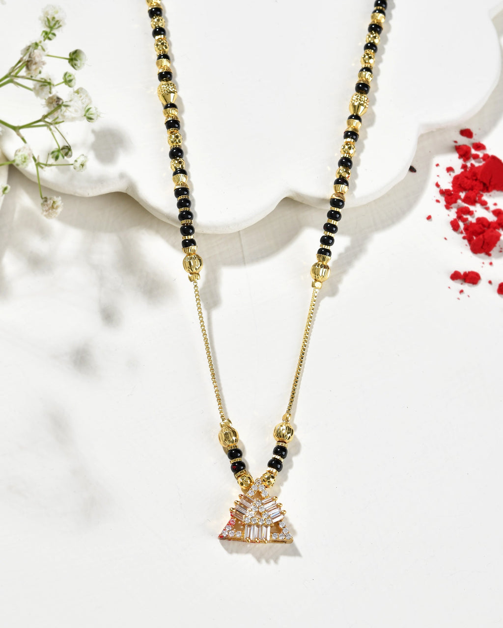 VOJ Gold-Polished Stone Studded Triangular Shaped Mangalsutra | Grocsy