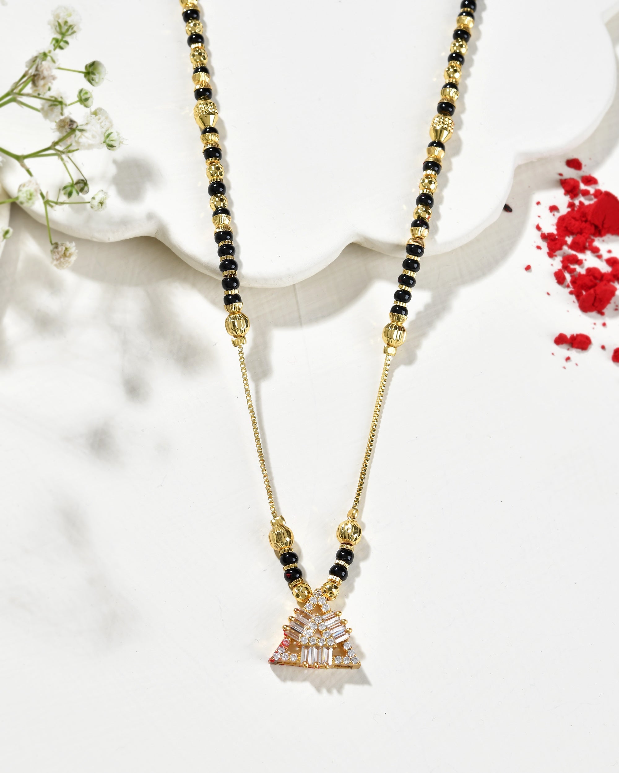 VOJ Gold-Polished Stone Studded Triangular Shaped Mangalsutra | Grocsy