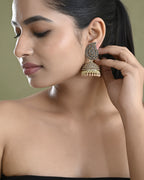 VOJ Gold Toned Stone Studded Done Shaped Jhumka Earrings