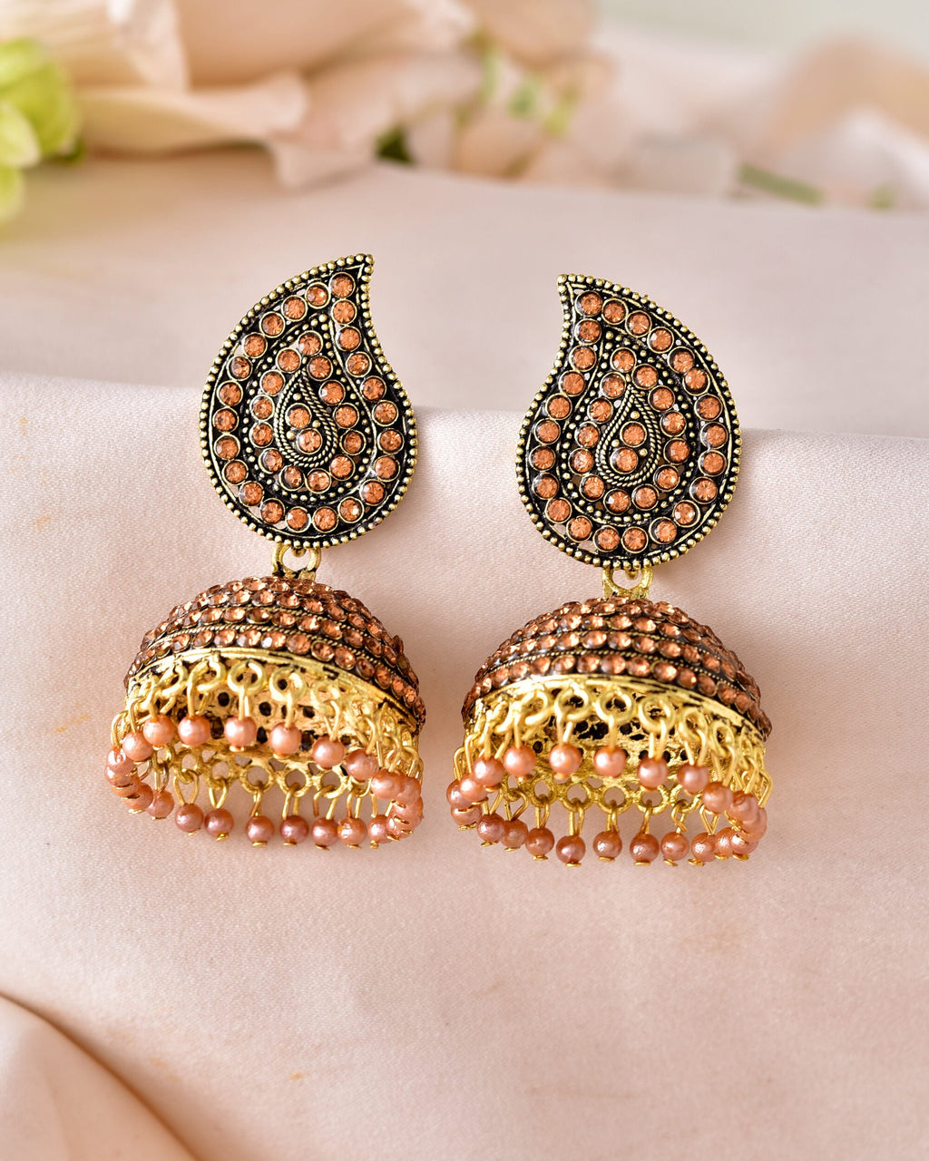 VOJ Gold Toned Stone Studded Done Shaped Jhumka Earrings