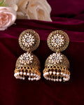 VOJ Gold Toned Stone Studded Done Shaped With Pearl Jhumka Earrings
