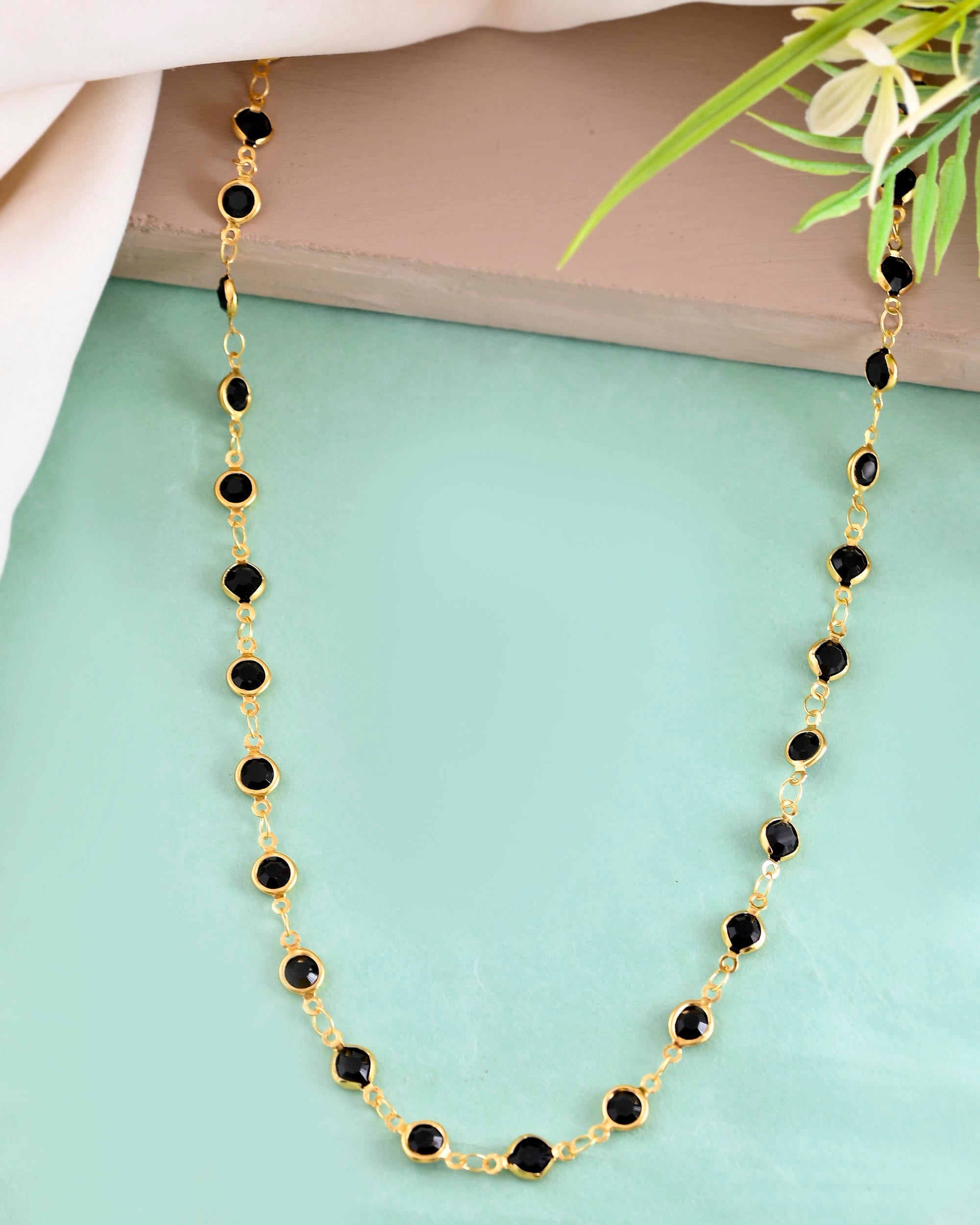 VOJ Gold-Polished Black Stone Studded Women Chain | Grocsy