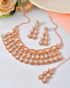 VOJ Rose Gold-Polished CZ Studded Jewellery Set With Maang Tikka | Grocsy