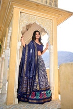 Vastranavya Designer Ikkat Print With Foil Work Lehenga Choli - Navy Blue | Grocsy