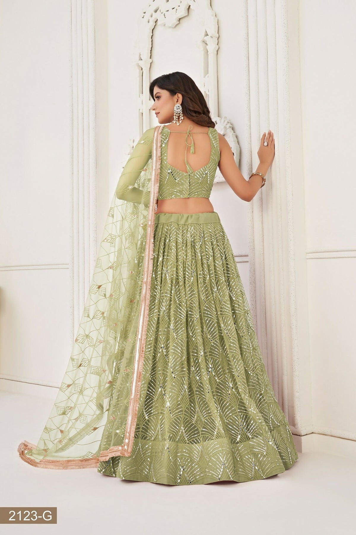 Eilara Glamorous Pista Green Net With Sequins And Thread Embroidery Real Mirror Work Lehenga Choli For Wedding | Grocsy