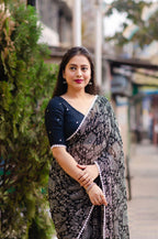 Black Poly Georgette Ethnic Motifs Saree with Unstitched Blouse - A2M | Grocsy