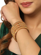 NVR Women's Set of 4 Gold-Polished Traditional Bangles | Grocsy