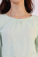 W for Woman Pastel Green Slub top with Hem And Sleeve Embroidered Scalloped Detail | Grocsy