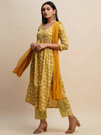 Mustard Pure Cotton Floral Printed Naira Cut Kurta And Bottom With Dupatta - Akashara | Grocsy