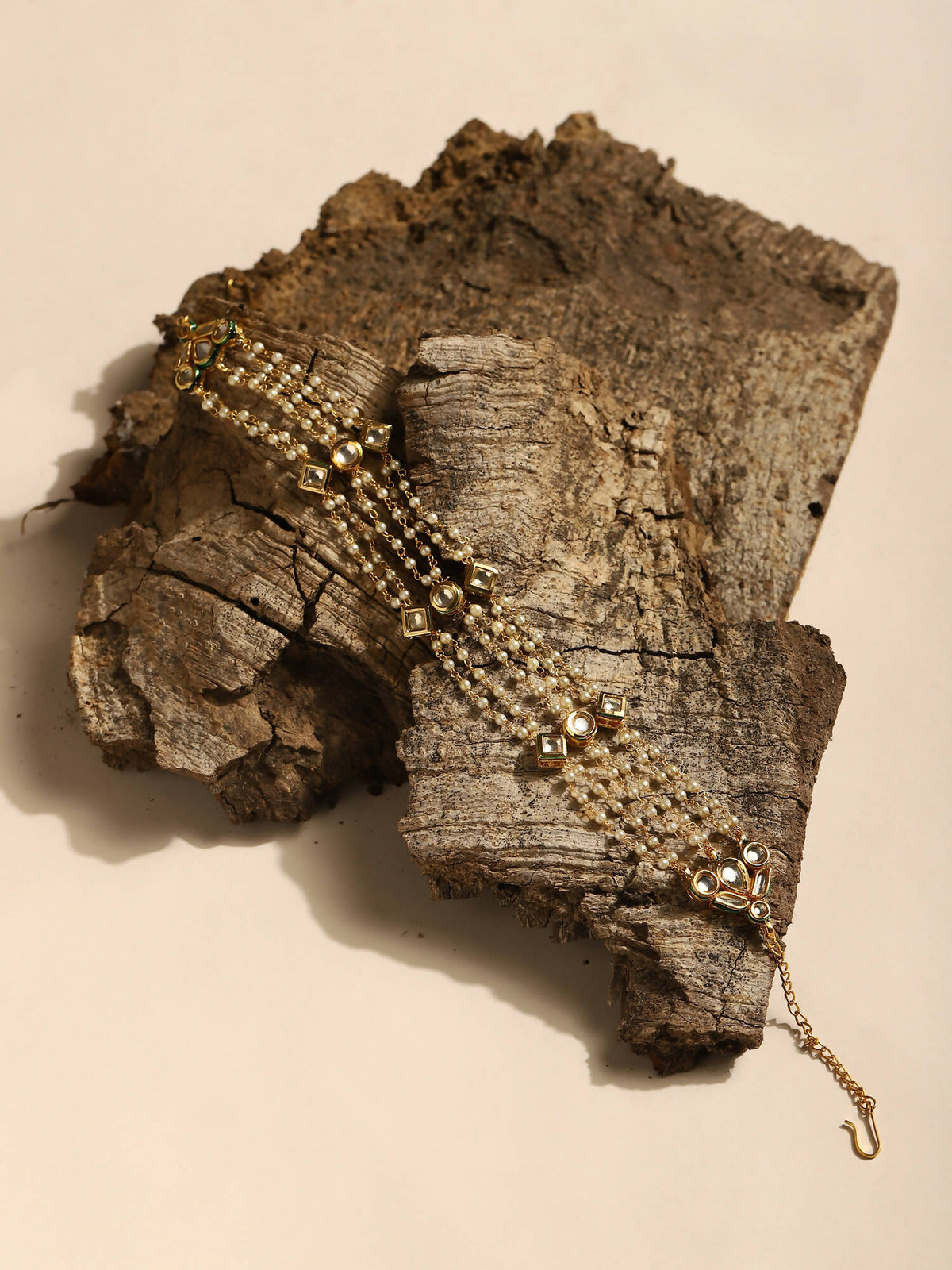 Gold-Polished White Kundan-Studded Pearl Head Chains - Ruby Raang | Grocsy