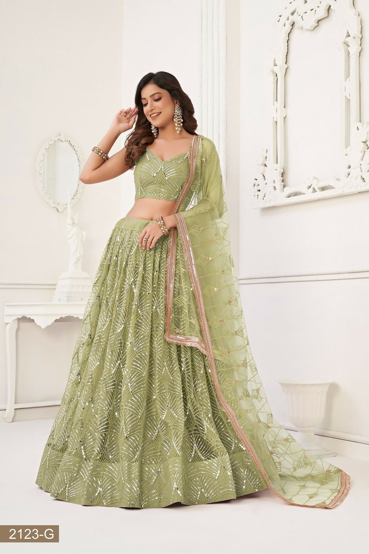 Eilara Glamorous Pista Green Net With Sequins And Thread Embroidery Real Mirror Work Lehenga Choli For Wedding | Grocsy