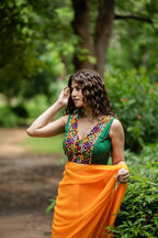 Amodini Designer Studio Women's Green Chinon Lehriya Sleeveless Blouse | Grocsy