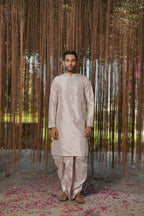 Sandstone Kanjivaram Machien Embroidered Pattu Set by Hilo Design | Grocsy
