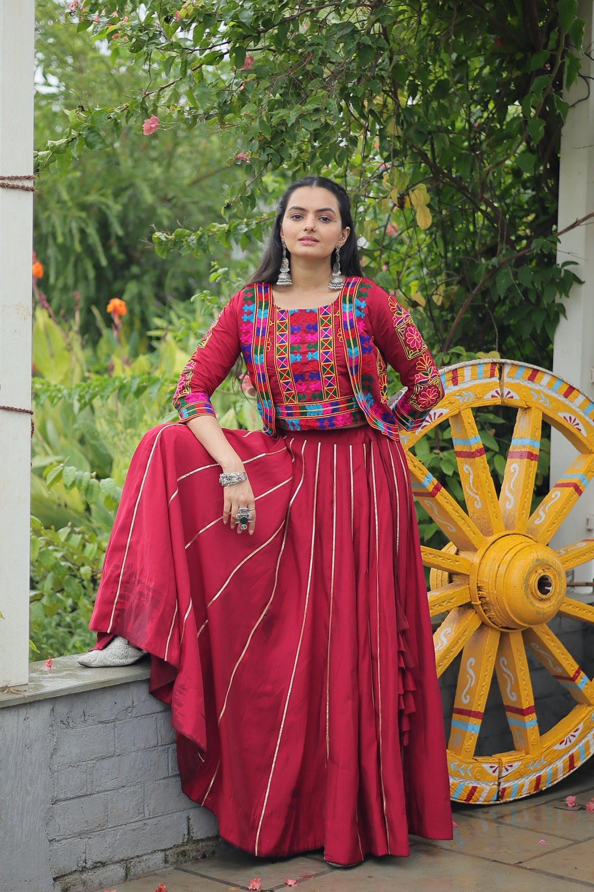 Evanik Navratri Maroon Roamn Fabric With Kutchi Work Koti Style Blouse Stitched Lehenga Choli | Grocsy
