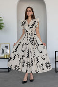 Pimu V-Neck Maxi Dress with White Graphic Print | Grocsy