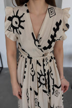 Pimu V-Neck Maxi Dress with White Graphic Print | Grocsy