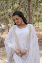 Evanik White Faux Blooming Gown With Dupatta With Rich Sequins Embroidered work | Grocsy