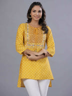 Juniper Women Yellow Muslin Printed High-Low Straight Tunic With Embroidered Yoke | Grocsy