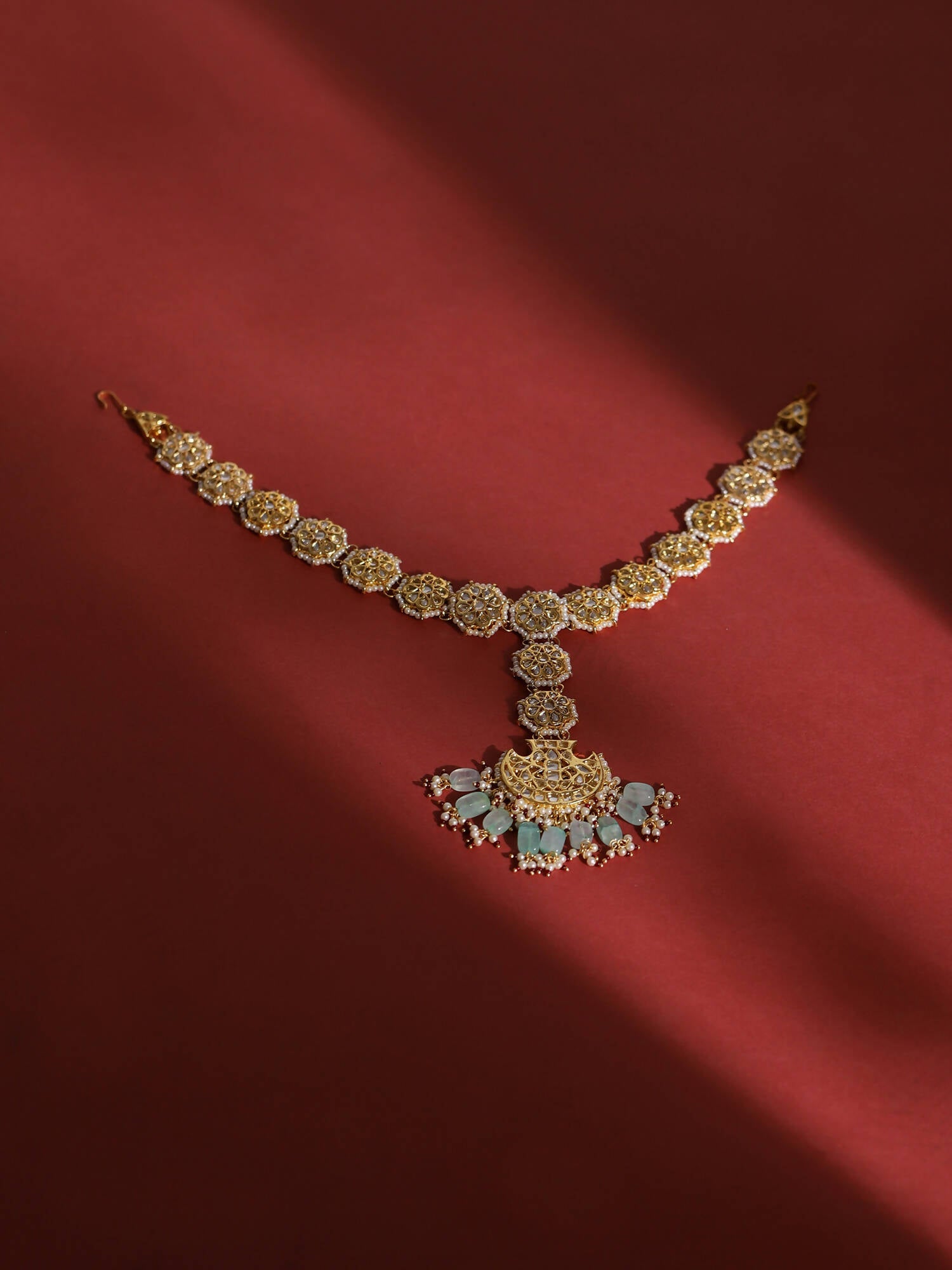 Gold-Polished White Blue Kundan-Studded Pearl Beaded Matha Patti - Ruby Raang | Grocsy