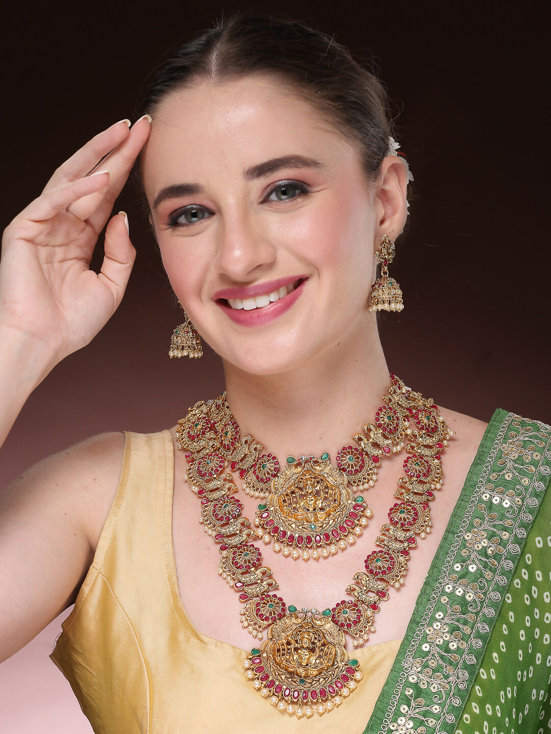 NVR Women's Set of 2 Gold-Polished Green & Pink Stone Studded Peacock & Lakshmi Design Temple Jewellery Set | Grocsy