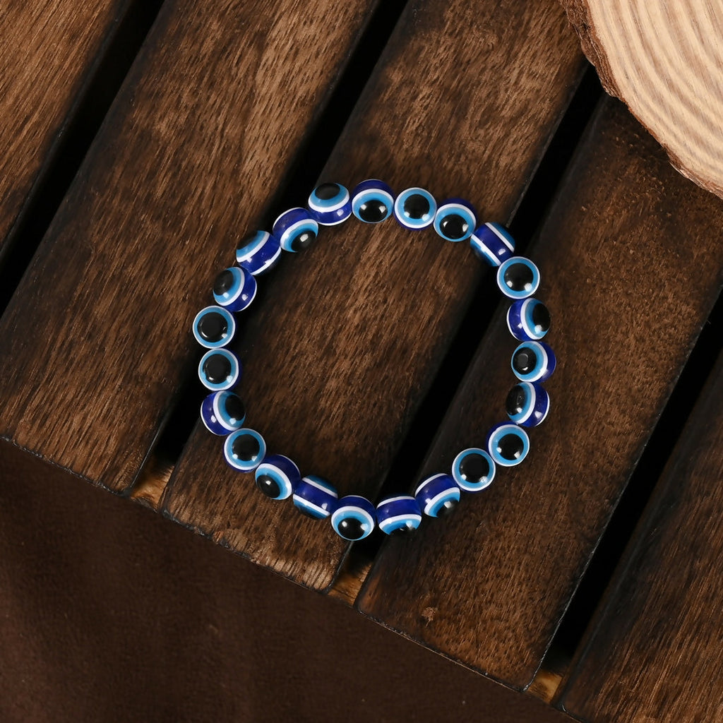 NVR Women & Men Blue Evil Eye Rakhi With Roli Chawal | Grocsy