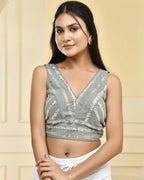 Amodini Designer Studio Teal Sequined Pearl Cutdana Sleeveless Padded Blouse | Grocsy