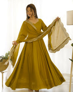 Teeya Creation Mustard Color Pure Roman Silk Chanderi Party Wear Fully Stitched Gown | Grocsy